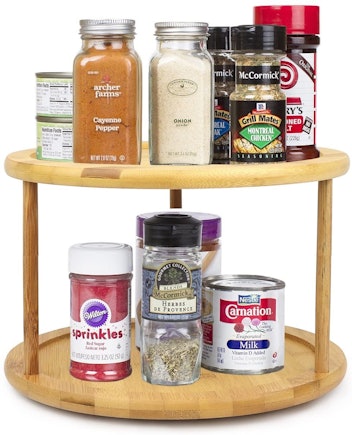 A two-tiered lazy Susan catches spice rack overflow.