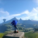A screenshot from Sonic Fronteris shows the titular character standing on a cliff looking out at a l...