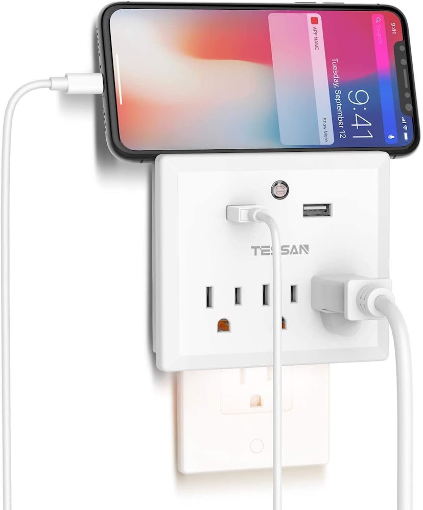 A multi-plug outlet extender provides extra USB wall chargers, a nightlight, and even phone storage.