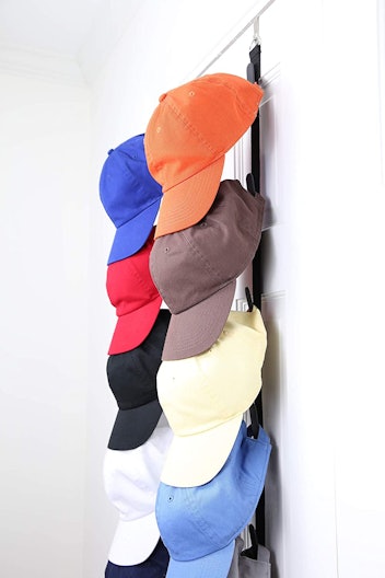 An over-the-door hat rack helps keep baseball caps orderly.