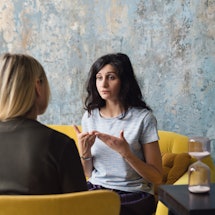 Stock photo of two women having a work meeting