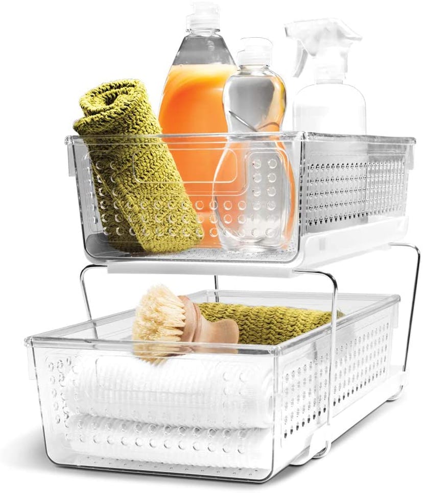 A 2-tier slide-out storage organizer can be stashed under the sink for supplies.