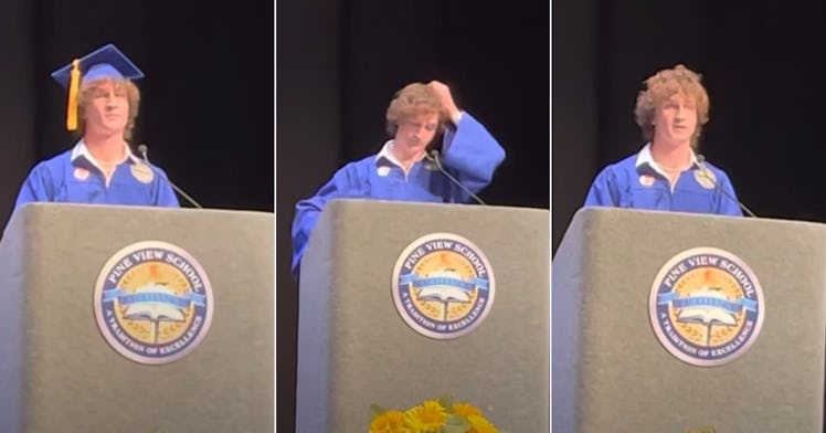 Zander Moricz at the podium in a graduation cap and gown making a speach