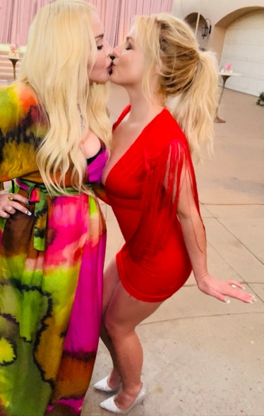 Madonna and Britney Spears kissing at Spears's wedding after-party