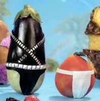 An eggplant wearing leather and studs pictured next to a peach wearing a jockstrap for Postmates' Bo...