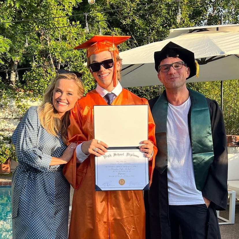 Reese Witherspoon and Ryan Phillippe with their son, celebrating his graduation