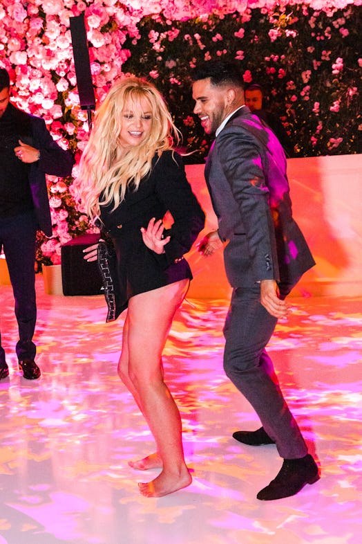 Britney Spears dancing at wedding reception on June 9, 2022 in Los Angeles, CA