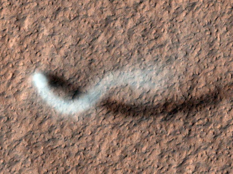 dust devil creating a long trail on mars
