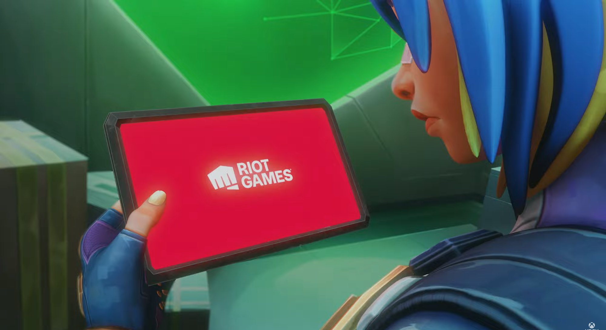 neon looking at riot games tablet