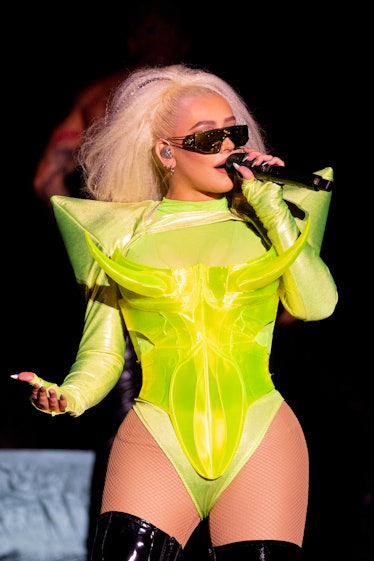 xtina wearing green