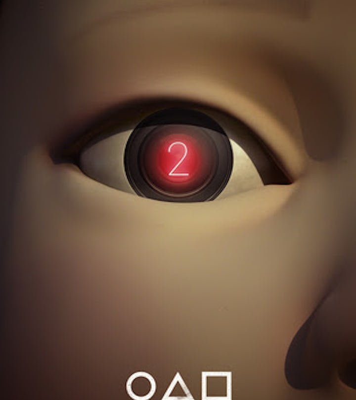 A red neon 2 is reflected in the eye of the iconic robotic doll from 'Squid Game.'