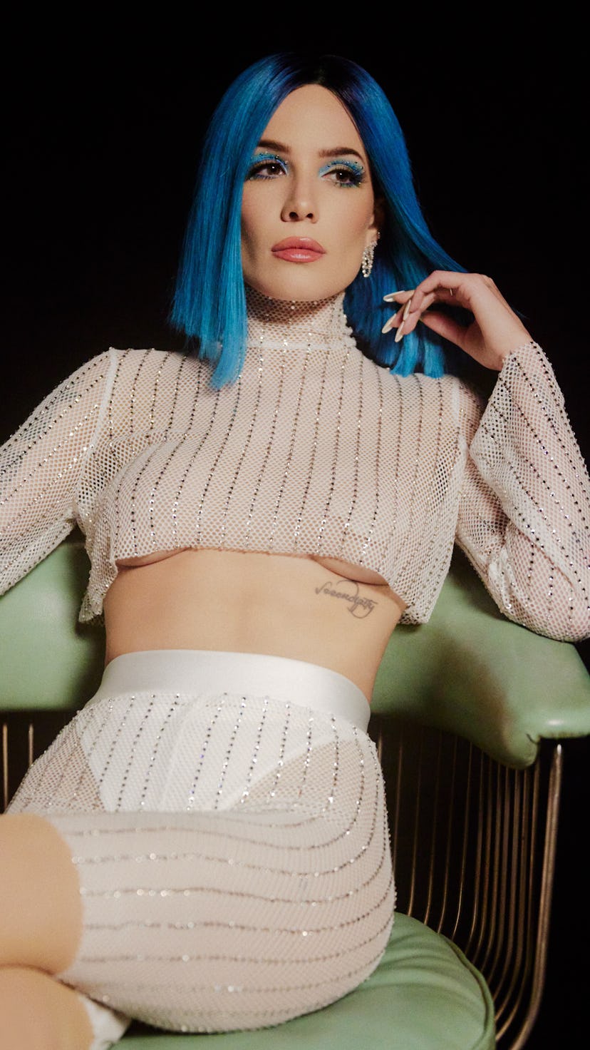 Halsey in a blue bob and a sheer white set that is sequined