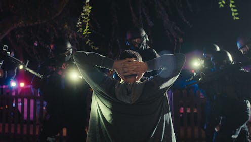 Unknown person being held at gunpoint by a SWAT team in 'Web of Make Beleive'