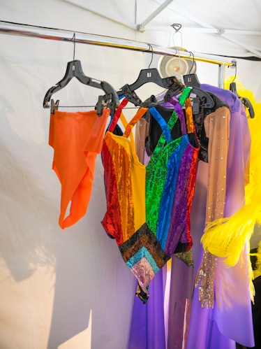 xtina's colorful pride looks hanging on a rack