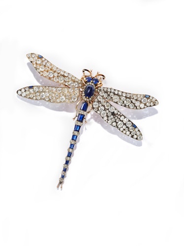A close-up of the dragonfly brooch