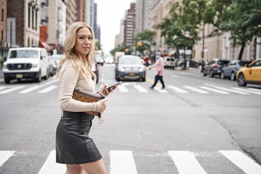 Ariel Epstein, the Prop Queen, crosses the street in New York