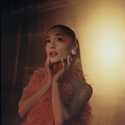 Ariana Grande wearing r.e.m. beauty chapter three lip products.