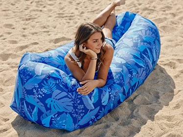 If you're wondering what to bring to a water park, this inflatable lounger is one of the weird but g...