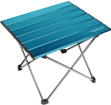 This folding table is one of the weird but genius products to pack for your beach vacay and should g...