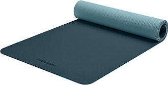 half unrolled Retrospec outdoor yoga mat in color ocean blue