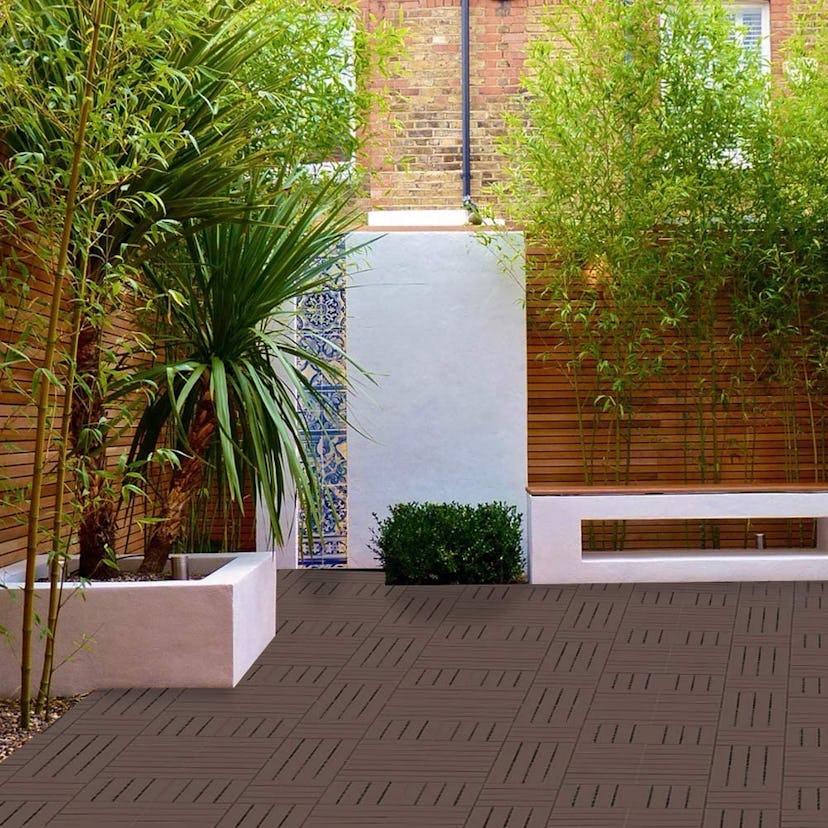 Easy-to-install deck tiles make creating a patio seating area a breeze.