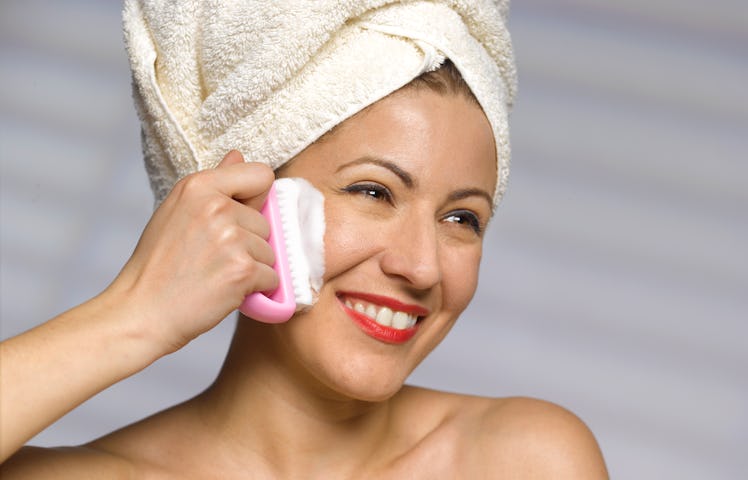 Scrubbing your face when you wash it is a big no-no, dermatologists say. 