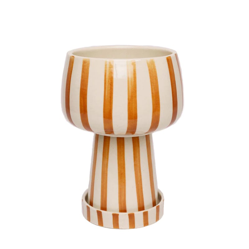 ceramic planter in orange and white stripe