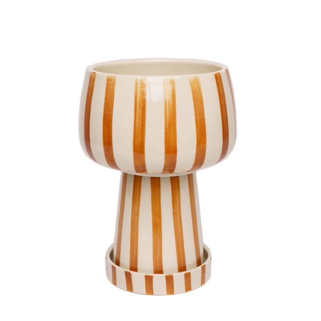 ceramic planter in orange and white stripe