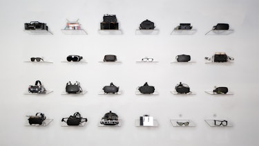 A wall of VR headset prototypes.