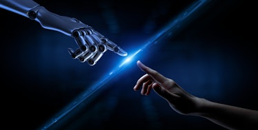 Human and robobt fingers touching