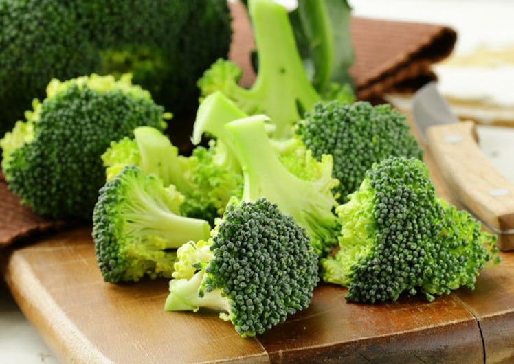 cutting board of broccoli