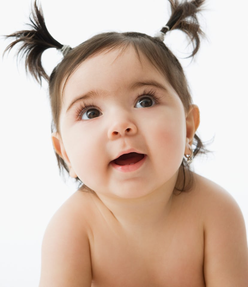 cute spanish girl names for cute babies like this adorable baby girl with two ponytails