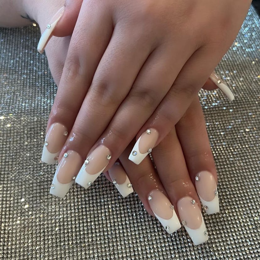 Add rhinestone accents to your coffin-shaped French manicure.
