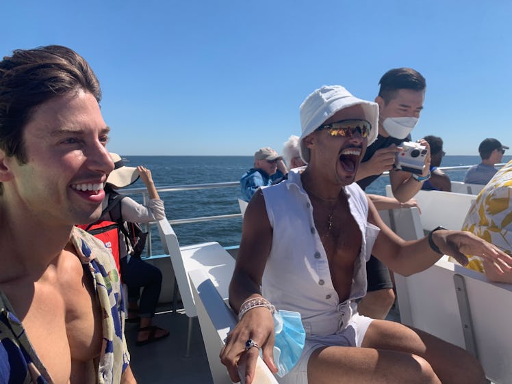 Fire Island cast members on a boat
