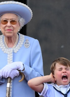 Queen Elizabeth and a miserable looking Prince Louis at the Queen's Jubilee