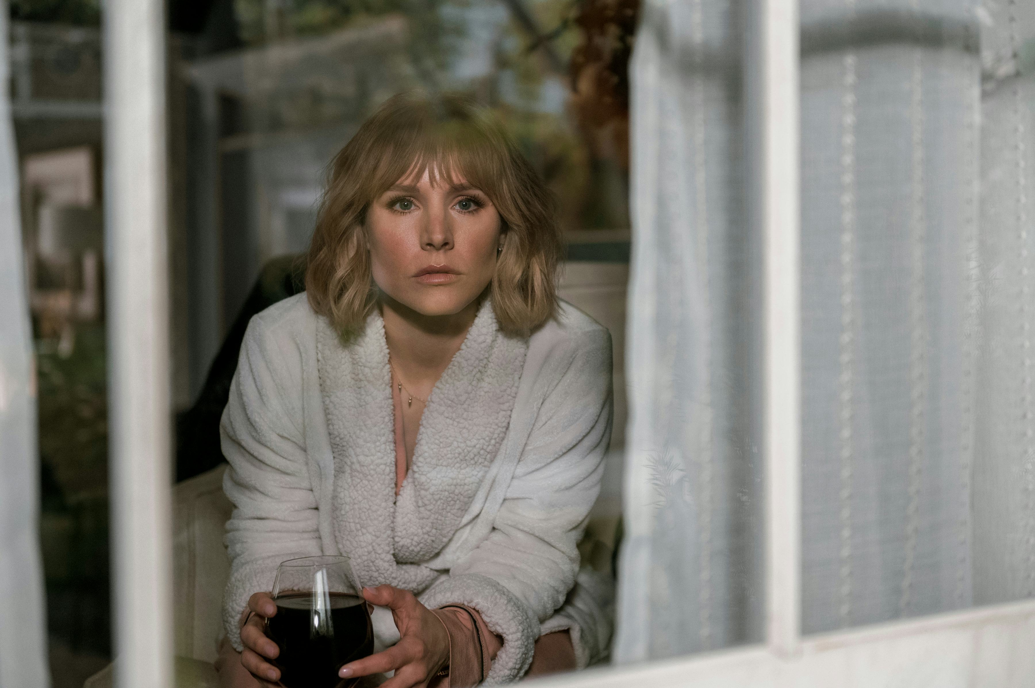 Kristen Bell stars in the dark comedy 'The Woman in the House Across the Street From the Girl in the...