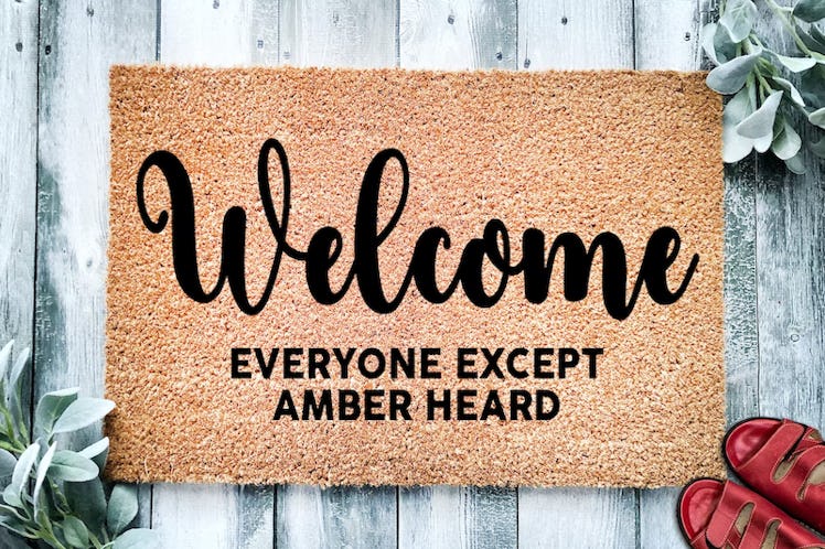"Welcome everyone except Amber Heard" mat