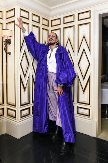 Lutfi Janania Zablah wearing a purple robe