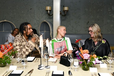 Samuel Kareem, Kennedy Yanko, and Elissa Auther at a dinner