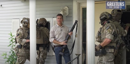 A screenshot of Missouri Senate candidate Eric Greitens's campaign ad, showing him holding a long ri...