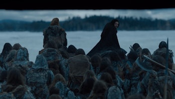 Jon Snow (Kit Harington) watches a gate close behind him in the Game of Thrones series finale