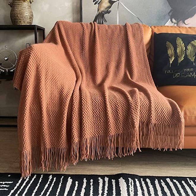 This bubble weave knit blanket offers texture with less bulk than most chunky blankets. 