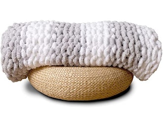 If you love a striped look, this chunky chenille knit blanket comes in two colorways. 