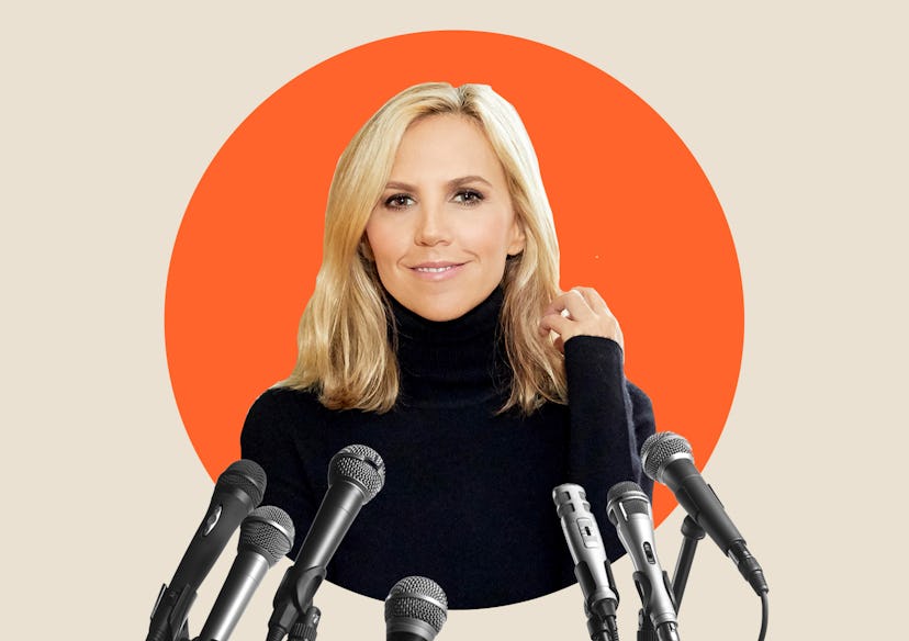 Tory Burch the fashion mogul in a black turtleneck sweater behind multiple microphones