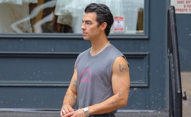 Joe Jonas wearing a sleeveless shirt