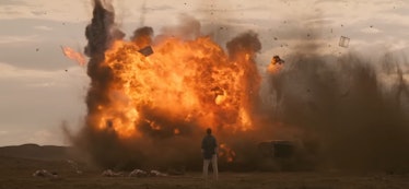 Eleven (Millie Bobby Brown) stands in front of an explosion in Stranger Things 4 Vol. 2