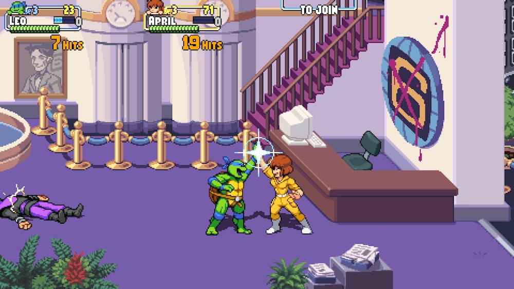 screenshot of Leonardo and April high-fiving in Teenage Mutant Ninja Turtles Shredder's Revenge game