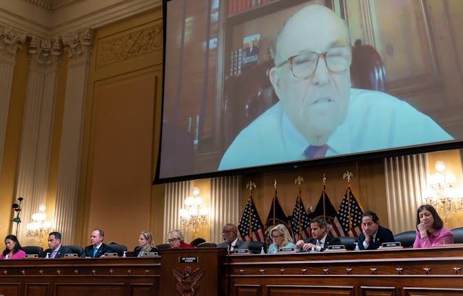A screenshot from a deposition with former President Trump adviser Rudy Giuliani is played during a ...