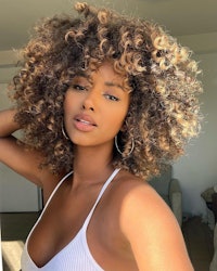 An influencer shows of her gorgeous curls 
