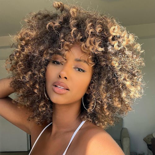 An influencer shows of her gorgeous curls 